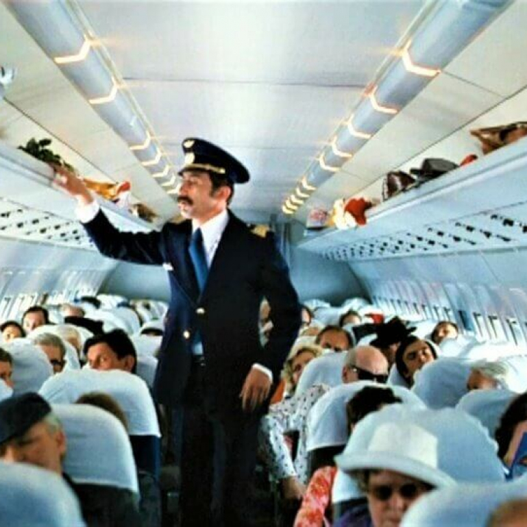 Попробуйте вспомнить по кадру с героями на борту самолета советские кинокартины